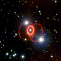 Hubble image of the triple-ring nebula left by SN 1987A.